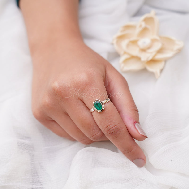 Emerald with store silver ring